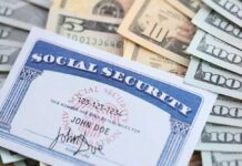 Social Security Shock Looms – DETAILS! A social security card placed on top of various denominations of U.S. currency