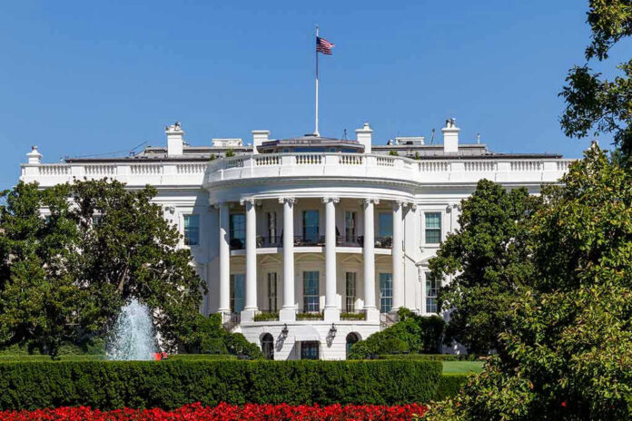 White House with trees and fountain.