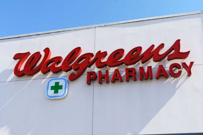 shutterstock_1994826506 Signs for Walgreens and Pharmacy on building facade