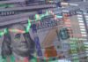 US dollar bills overlaid with stock market candlesticks and price data